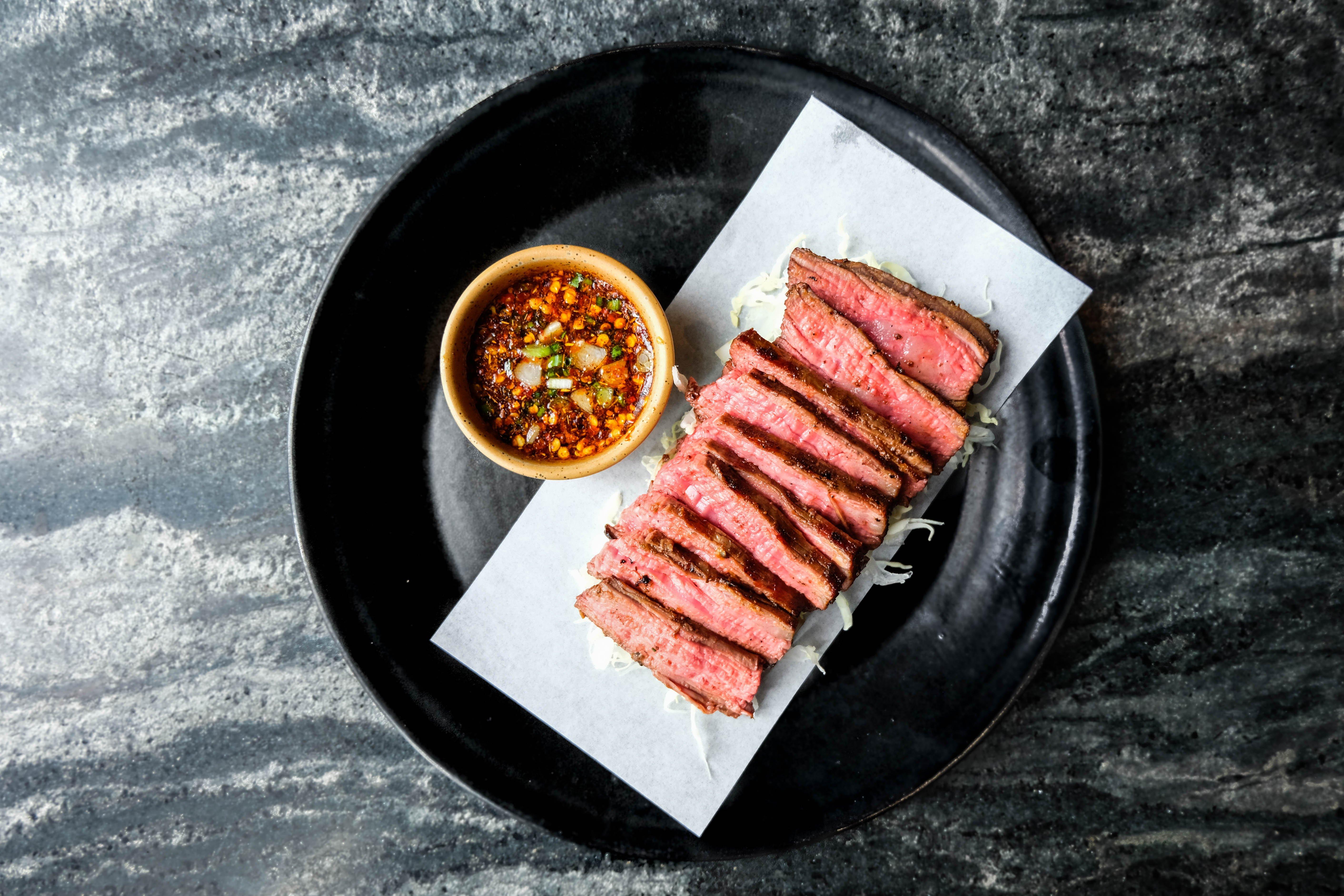 Hotel Indigo Bangkok Wireless Road By Ihg Εξωτερικό φωτογραφία A plate of grilled steak